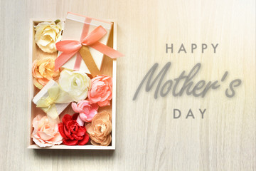 Happy Mother's Day with gift boxes and flowers on white wooden background,greeting card with roses