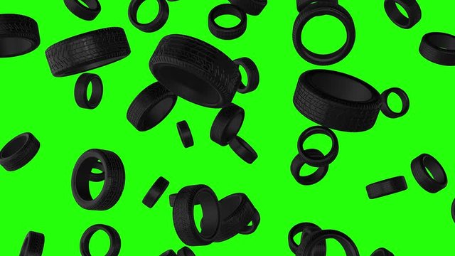 3d rain of tyres falling on green screen background. Pneumatics flying on chroma key. Car tire wheel protector concept. Close up view. 4k animation.