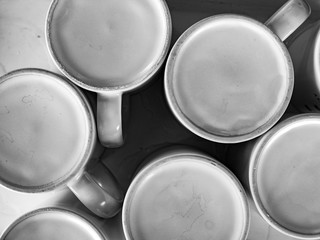 Turned over identical design ceramic cups