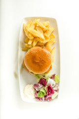 Delicious Hamburger from above with french fries