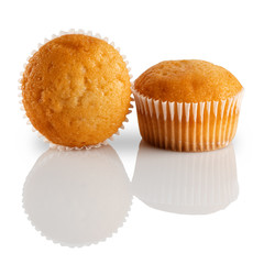 Cupcakes with reflection are isolated on a white background.