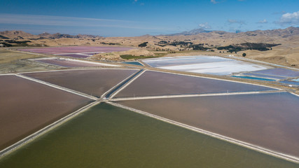 Grassmere - Pink lake in New Zealand. The lake is used for the production of salt.