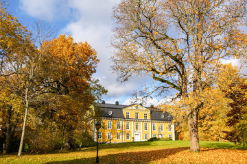 Beautiful view of Mustion Linna manor and park in autumn, Finland