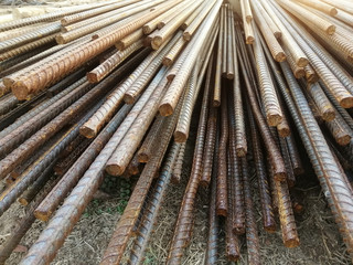 Steel rods or bars used to reinforce concrete. Deformed steel. Construction rebar steel work reinforcement in conncrete structure of building. 