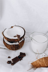 Coconut milk. Organic vegetable milk. Ripe Coconuts with Chocolate