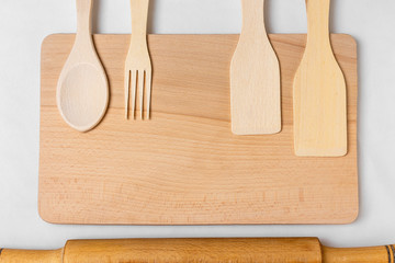 wooden kitchen accessories isolated on white background. Plastic free. Natural concept.