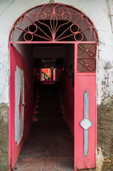 Traditional decorated pink door in Chefchaouen, Morocco