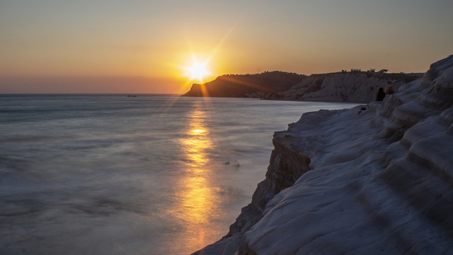 greeting to the sun at the Scala dei Turchi at sunset