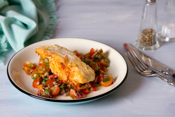 Pan fried cod fish with tomato salsa