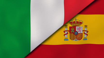 The flags of Italy and Spain. News, reportage, business background. 3d illustration