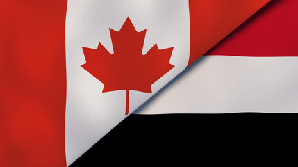 The flags of Canada and Yemen. News, reportage, business background. 3d illustration