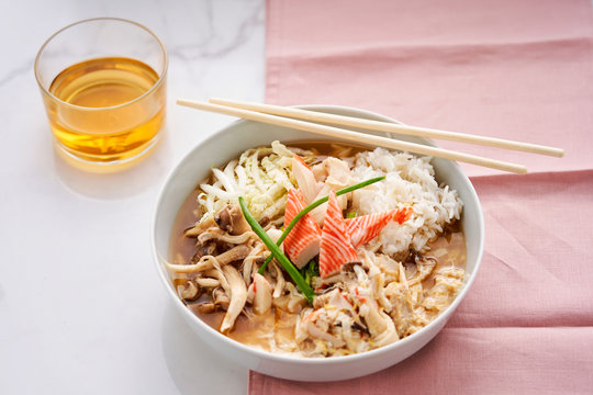 Asian-style bowl with mushrooms, rice and surimi