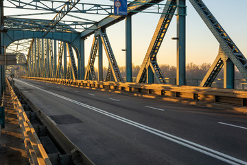 Fototapeta na wymiar Jozef Pilsudski road bridge in the morning light. Torun, Poland. Europe.