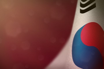 Republic of Korea (South Korea) flag for honour of veterans day or memorial day. Glory to the Republic of Korea (South Korea) heroes of war concept on red dark velvet background.