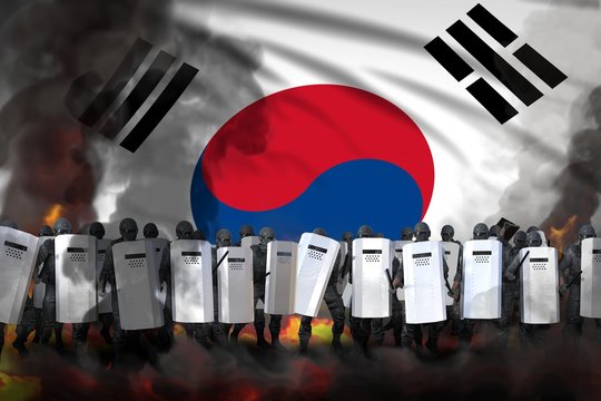 Republic of Korea (South Korea) police guards in heavy smoke and fire protecting law against demonstration - protest stopping concept, military 3D Illustration on flag background