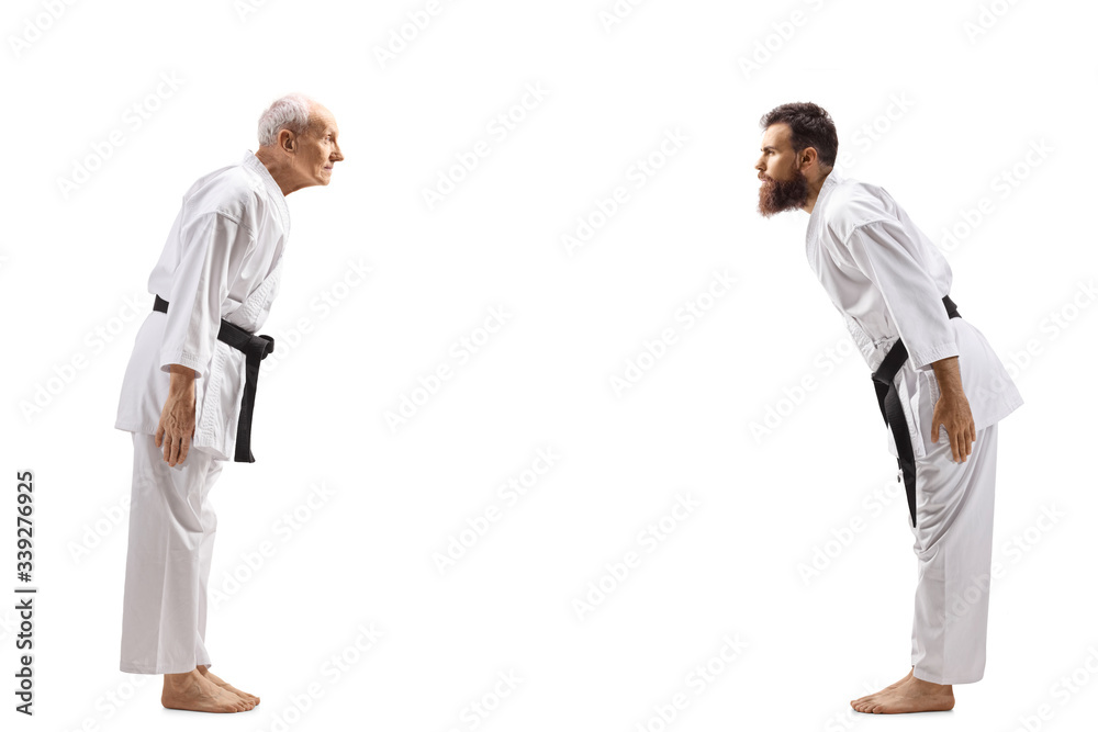 Sticker Karate masters with black belts bowing