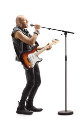 Male singer with an electric guitar