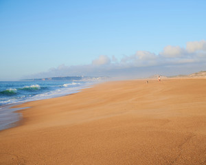 Fototapeta na wymiar Beach of Salgado in Famalicão da Nazaré at late afternoon