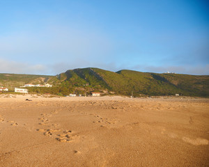Fototapeta na wymiar Beach of Salgado in Famalicão da Nazaré at late afternoon