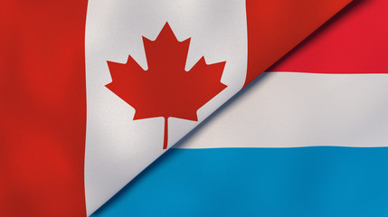 The flags of Canada and Luxembourg. News, reportage, business background. 3d illustration