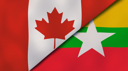 The flags of Canada and Myanmar. News, reportage, business background. 3d illustration