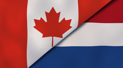 The flags of Canada and Netherlands. News, reportage, business background. 3d illustration © Maksym Kapliuk
