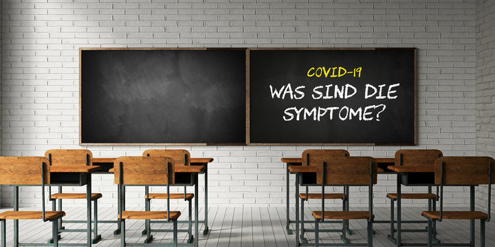 empty classroom with German message for COVID-19, WHAT ARE THE SYMPTOMS? on a blackboard