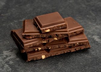 pieces of chocolate with nuts closeup