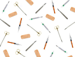 Doctors tolls and instruments on an white background. Flat lay image of randomly arranged medical equipment.