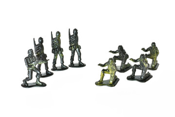 isolated image of plastic toy soldiers on a white background