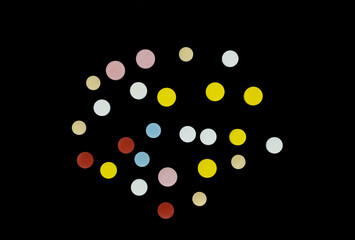 Pharmaceutical pills on black background