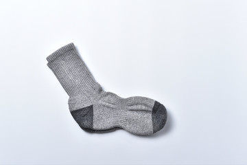 Gray warm socks on a white background