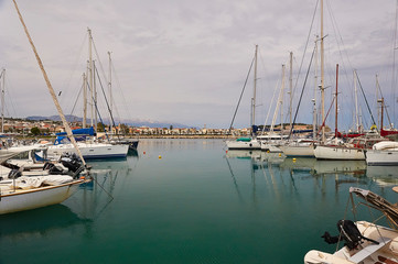 RETHYMNO, THE CRETE ISLAND, GREECE - MAY 30, 2019: The yachts in the harbor of Rethymnon.