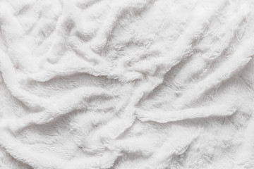 Top view of animal abstract horizontal white wool texture background. Wrinkled lamb fur coat skin,