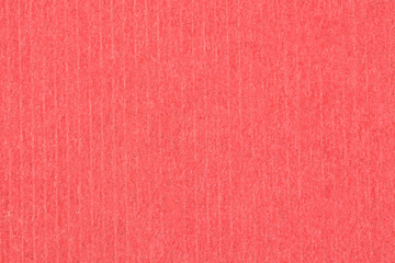 A vintage red paper background with pattern. Top view.