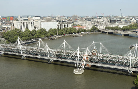 Railway Bridge Which Connected Charing Cross Station With Waterloo Station. Modern Bridge Across Thames River In Lameth Part Of London. View From London Eye. Amazing City With So Dominants