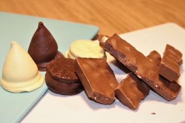 Different types of chocolates and alfajores.