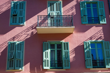 Nice, France - April 2017: Colours and styles of Nice classic apartment buidlings