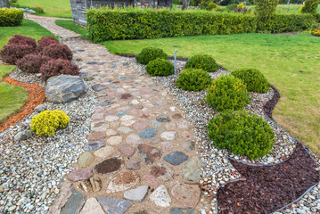 Stone walkway in the garden of a country house