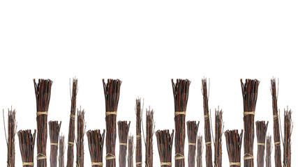 Bundles of wood twig sticks isolated on white background