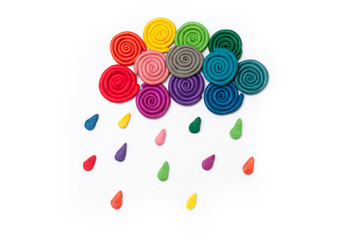Colorful clay cloud with rain drops on white background