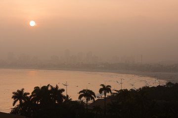 View of Enseada beach, Guaruja, during a misty sunset