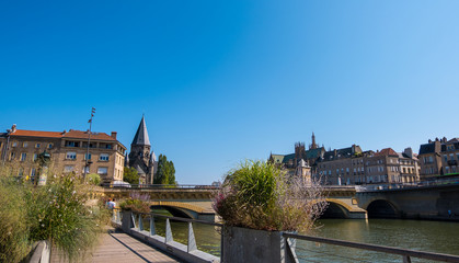 Fototapeta na wymiar Moyen Pont des Morts or Middle Bridge on the Moselle River in the historical center of Metz, Lorraine, France