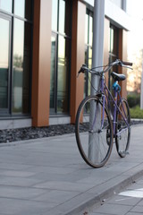 bicycle in front of an office building