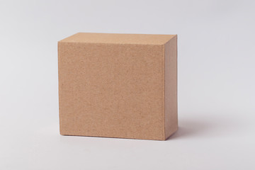 closed cardboard box isolated on white background Mockup for design - obrazy, fototapety, plakaty