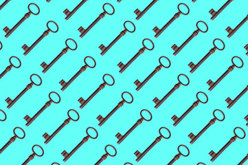 pattern of old rusty keys on a blue background. the key is repeated many times