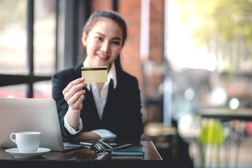 Businessman working on financial business via laptops and credit cards