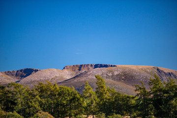 cairngorm mountain range in the Scottish highlands during summer