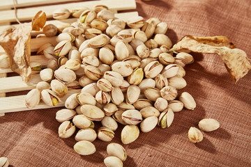 Charred cashew nuts in light containers