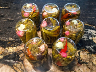 Green peppers freshly picked and marinated in pots